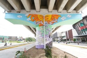 A Collaborative Mural painting by KSS visual artists on a beam post under the Tagum City flyover.