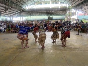 A group performs before audiences at an evacuation center in Barangay Bingkungan.