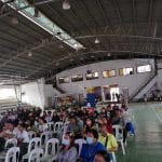 Audiences watch a performance at an evacuation center in the Municipality of Asuncion, Davao de Oro.