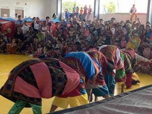 Audiences admire the performance of a group at an evacuation center in Barangay Bingkungan.