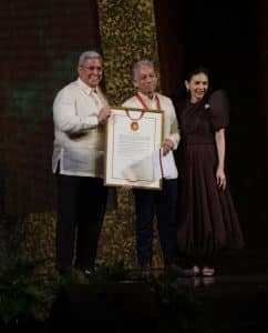 Joey Ayala receives his Gawad Sining recognition from CCP Board trustee Jonathan Velasco (left) and CCP President Kaye Tinga. (Photo by Kiko Cabuena CCP)