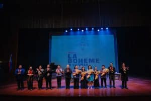 CCP President Kaye C. Tinga poses with with Viva Voce Voice Lab artistic director Camille Lopez-Molina, director Alexander Cortez, pianist Oliver Salonga, vocal coach Pablo Molina, andthe cast of La Boheme.